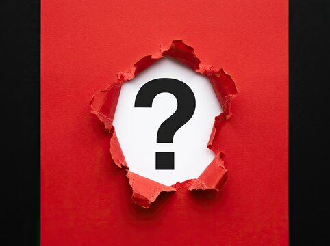 Question mark appearing through torn red paper suitable for business problem solving visuals representing curiosity and seeking answers