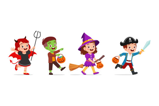 Happy multiracial children walking in Halloween costumes smiling excited for trick or treat celebration