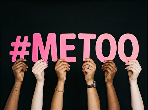 Diverse hands holding pink MeToo hashtag letters on black background suitable for social activism symbolizing unity empowerment and solidarity