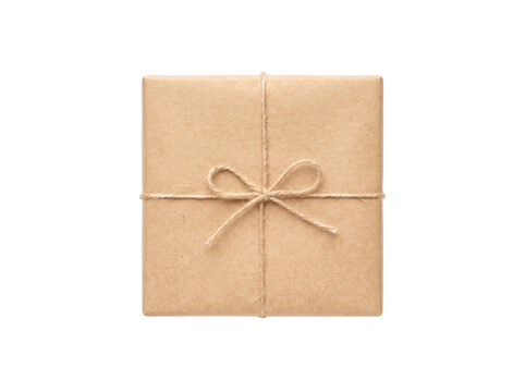 Gift box wrapped in brown craft paper tied with twine string as isolated on transparent background