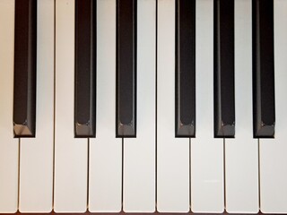 Piano keys close up background - White keys and black keys background © Kpictures