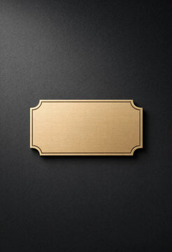 Blank Gold Nameplate on Dark Charcoal Background for Professional Signage and Branding