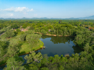 Fototapeta premium Freshwater lake among tropical forest. Watershed protection, natural carbon storage, biodiversity and sustainable environment. Water conservation, biodiversity and sustainable natural resources.