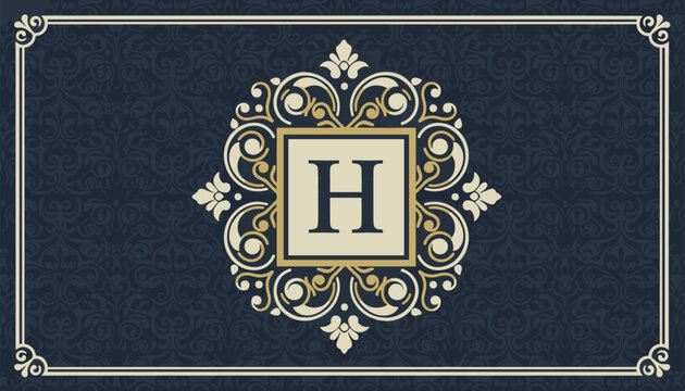 Ornate monogram with the letter H enclosed in a decorative frame over a dark blue vintage seamless damask pattern.