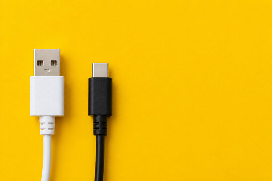 USB-A and USB-C Connector Comparison on Yellow Background