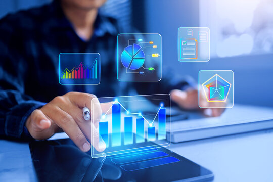 data analysis concept with a man working on tablet to summarize graph marketing information in virtual interface