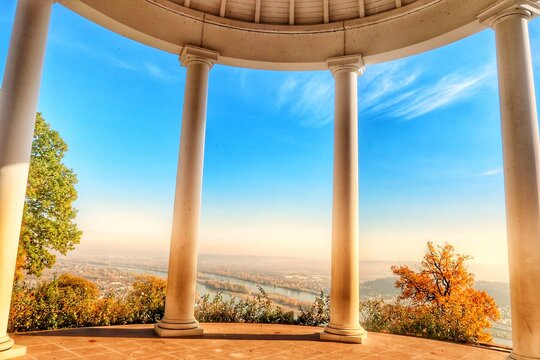 View through the columns of the Niederwald Temple (Monopteros) overlooking the Rhine Valley near R&uuml;desheim am Rhein, Germany