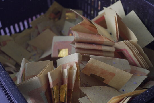 Traditional Chinese joss paper offering