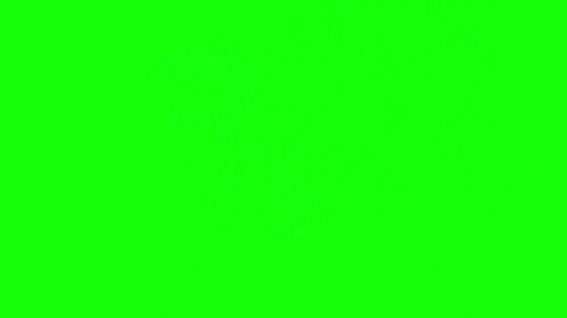 Green screen background provides a solid chroma key surface for video production and digital compositing.