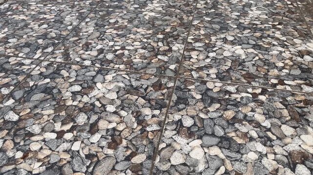High Angle Shot of Ceramic Tiles Floor with Natural Pebble Stone Pattern