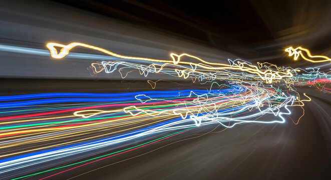 Colorful Light Trails Showing Dynamic Motion And Speed Effects Inside Tunnel