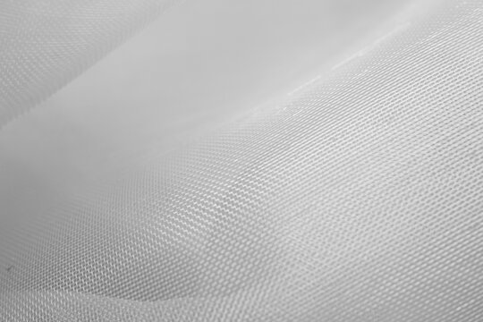 Abstract White Synthetic Fabric Texture Background with Fine Mesh Pattern
