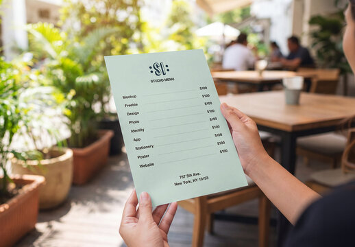 Menu Card in Hands Mockup