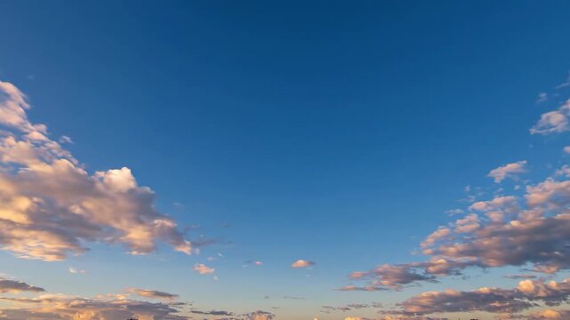 Vast Blue Sky with Wispy Clouds at Sunset.
