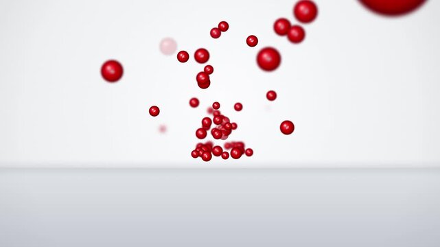 Abstract 3D animation of shiny red spheres bouncing and floating on a clean white background with depth of field