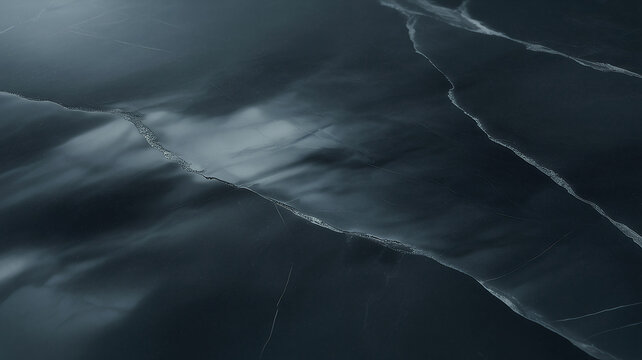 Dark marble texture with white veins presents a dramatic moody surface