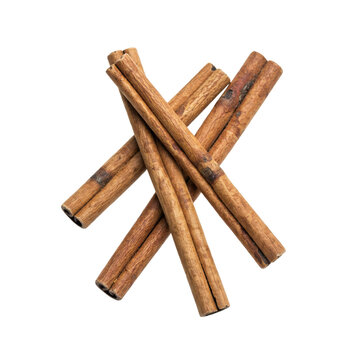 A stack of three dried aromatic cinnamon bark sticks arranged in a crisscross pattern for culinary use isolated on a transparent background