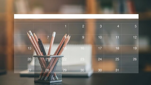 Calendar overlay with office supplies and pencils on a blurred background for planning and time management
