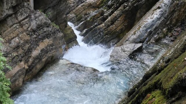 Cascading mountain stream rushing through the rocky Wimbachklamm gorge in Bavaria, Germany
