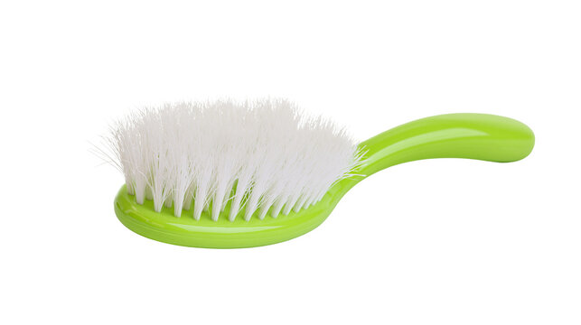 Bright green plastic baby hair brush with soft white bristles, isolated on transparent background
