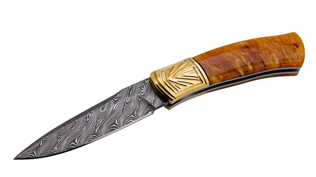 Damascus steel folding knife with ornate gold bolster and burl wood handle, isolated on transparent background