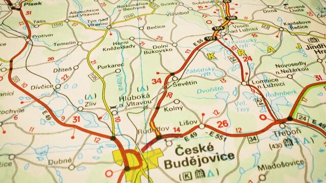 road network leading to ceske budejovice, czech republic gliding over atlas map