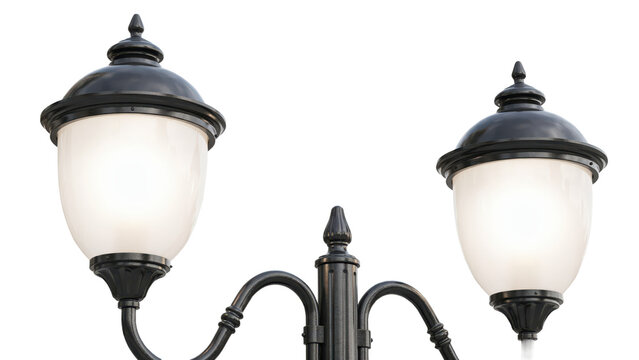 Two classic black metal street lamps with glowing white glass globes mounted on a decorative post isolated on a transparent background