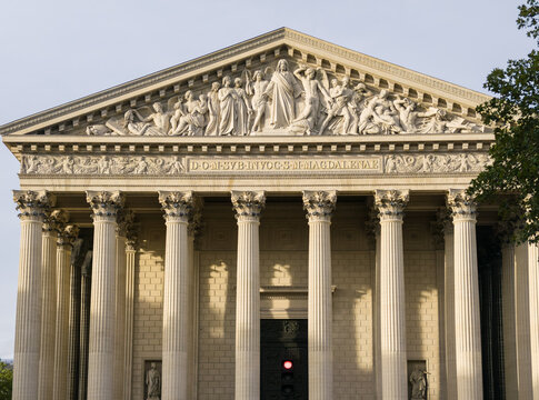 Madeleine Church neoclassical architecture with sculptures and Corinthian columns, a landmark in Paris