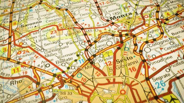 road network leading to milan, italy, gliding view