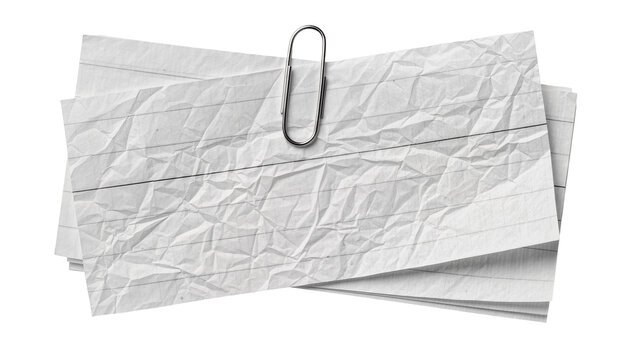Stack of crumpled lined paper notes held by a silver paperclip, isolated on transparent background