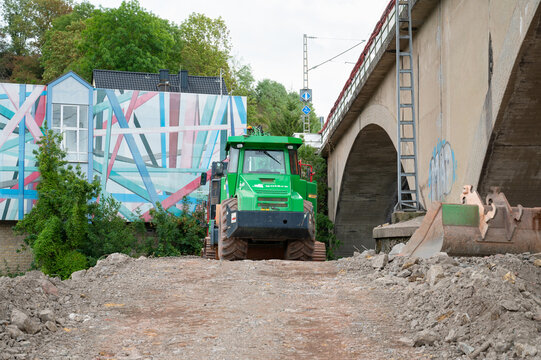 Construction site, excavator and road roller, temporary bank reinforcement, crushed stone, concrete bridge Wasserbillig, Luxembourg