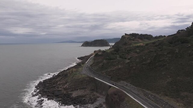 Aerial view of a cycling race in the Basque Country.