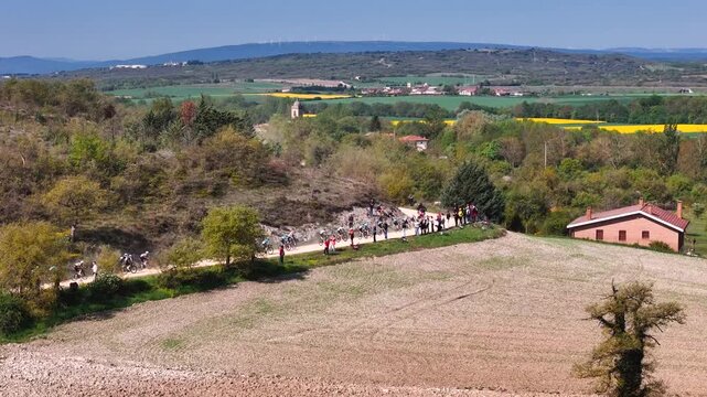 Cycling race through white gravel roads at the Basque Country.
