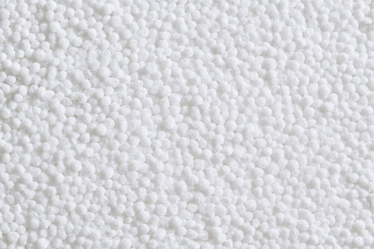 White polystyrene foam beads texture used for packaging and insulation  
