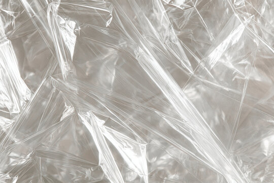 Transparent plastic sheet texture with crumpled folds and wrinkles  