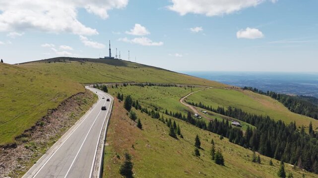 Cars Climbing Transalpina Road Near Ranca