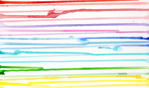 Horizontal rainbow watercolor lines drip on a white background