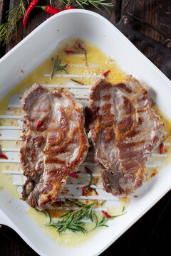 Pork collar cutlets in grill pan