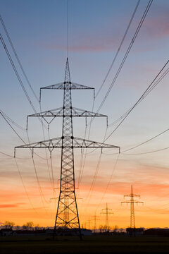 Germany, Bavaria, Pylons at sunset