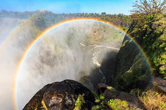 Southern Africa, Zimbabwe, Victoria Falls with rainbow