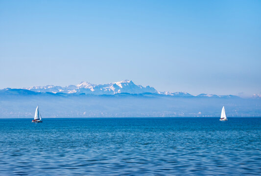 Germany, Lake constance, sailing boats, Mountains Altmann and Saentis in Switzerland