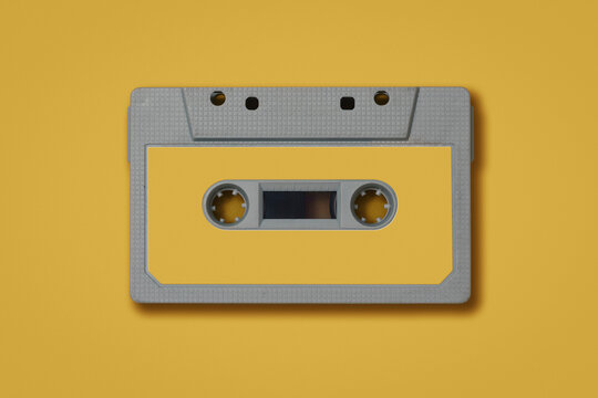 Vintage Cassette Tape On yellow Background