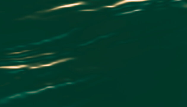 Water surface with sunlight reflecting on gentle ripples