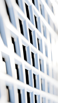 White metal grid structure with abstract geometric pattern