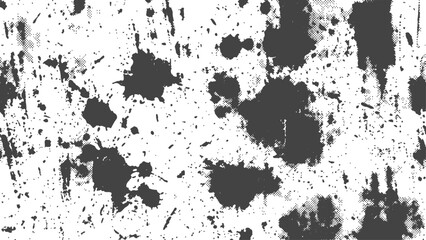 Fototapeta premium Dark ink splatters across a clean white background with a textured distressed effect