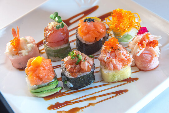 Assorted sushi platter on white plate