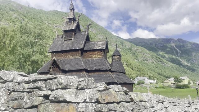 Borgund Stave Church in L&aelig;rdal, Norway, featuring distinctive layered wooden roofs, traditional stave architecture