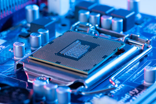CPU microprocessor silicon chip installed inside motherboard socket next to BIOS components as a conceptual backdrop for hardware level cybersecurity AI technology infrastructure data processing