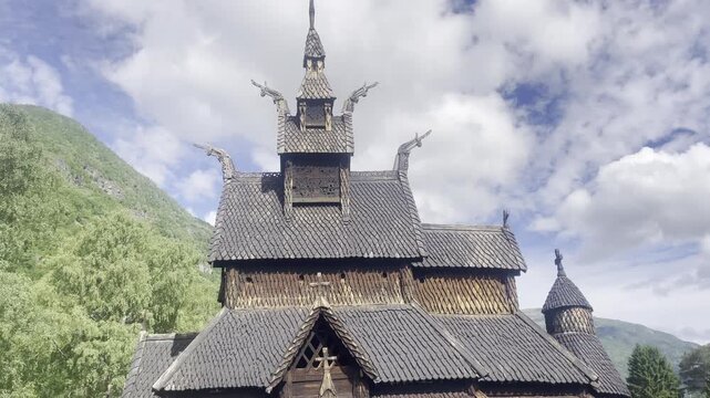 Borgund Stave Church in L&aelig;rdal, Norway, featuring distinctive layered wooden roofs, traditional stave architecture travel destination
