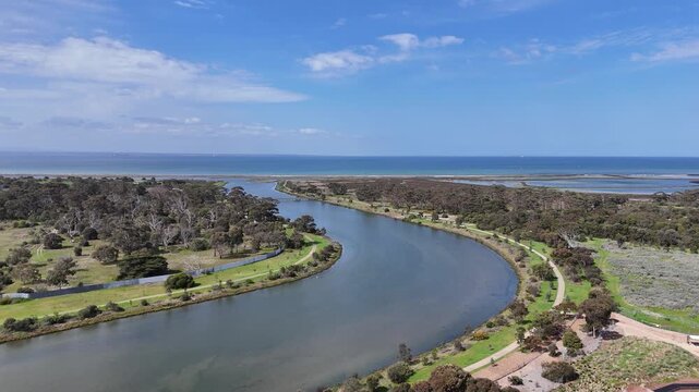 Scenic aerial&nbsp;of Laverton Creek curving through coastal parklands and wetlands toward Port Phillip Bay near Altona Meadows in Melbourne, Victoria, Australia. Conservation and nature reserve